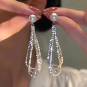 PENDIENTES DE GOTA DE AGUA CON DIAMANTE
